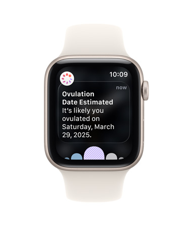 „Apple Watch SE 3“, aliuminio korpusas, žvaigždžių šviesos spalva, ovuliacijos datos apskaičiavimo pranešimas iš „Ciklo sekimo“ programoje „Sveikata“, „Digital Crown“, sportinis dirželis, žvaigždžių šviesos spalva