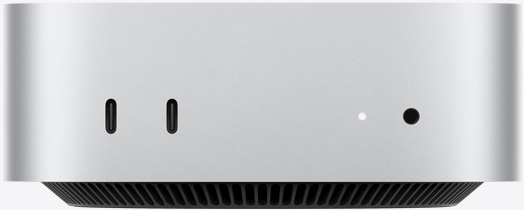 Sidabro spalvos „Mac mini“ vaizdas iš priekio, matomi priekiniai prievadai: du USB‑C prievadai ir 3,5 mm ausinių jungtis