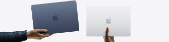 様々なカラーのMacBook Neoノートブック。それぞれを異なる人物の手が持っている